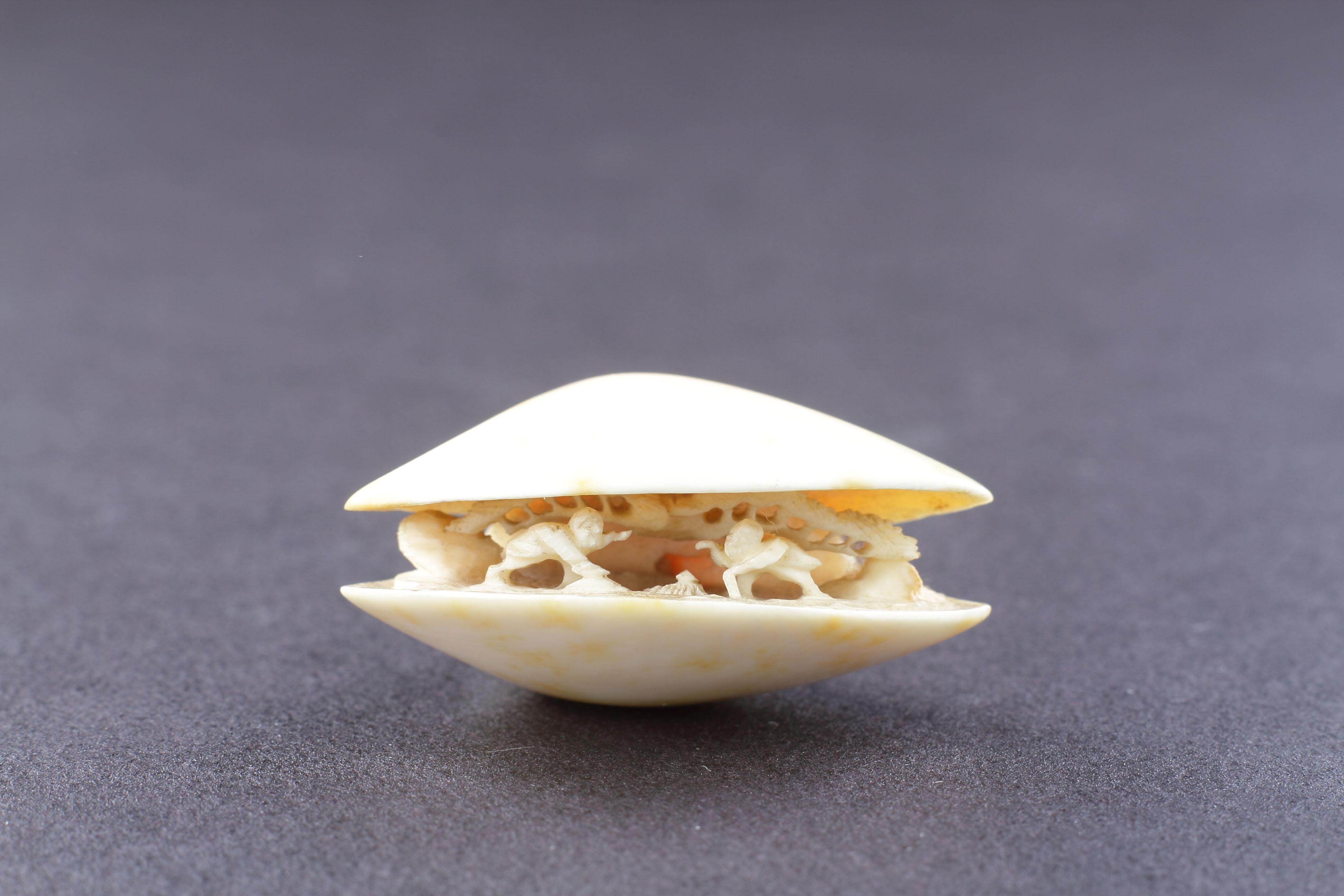 Japanese Carved Ivory Netsuke Depicting the ‘Clam’s Dream’ 